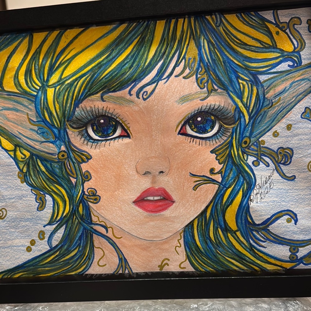Whimsical Blue and Yellow Portrait Drawing of a fairy named Mia.
